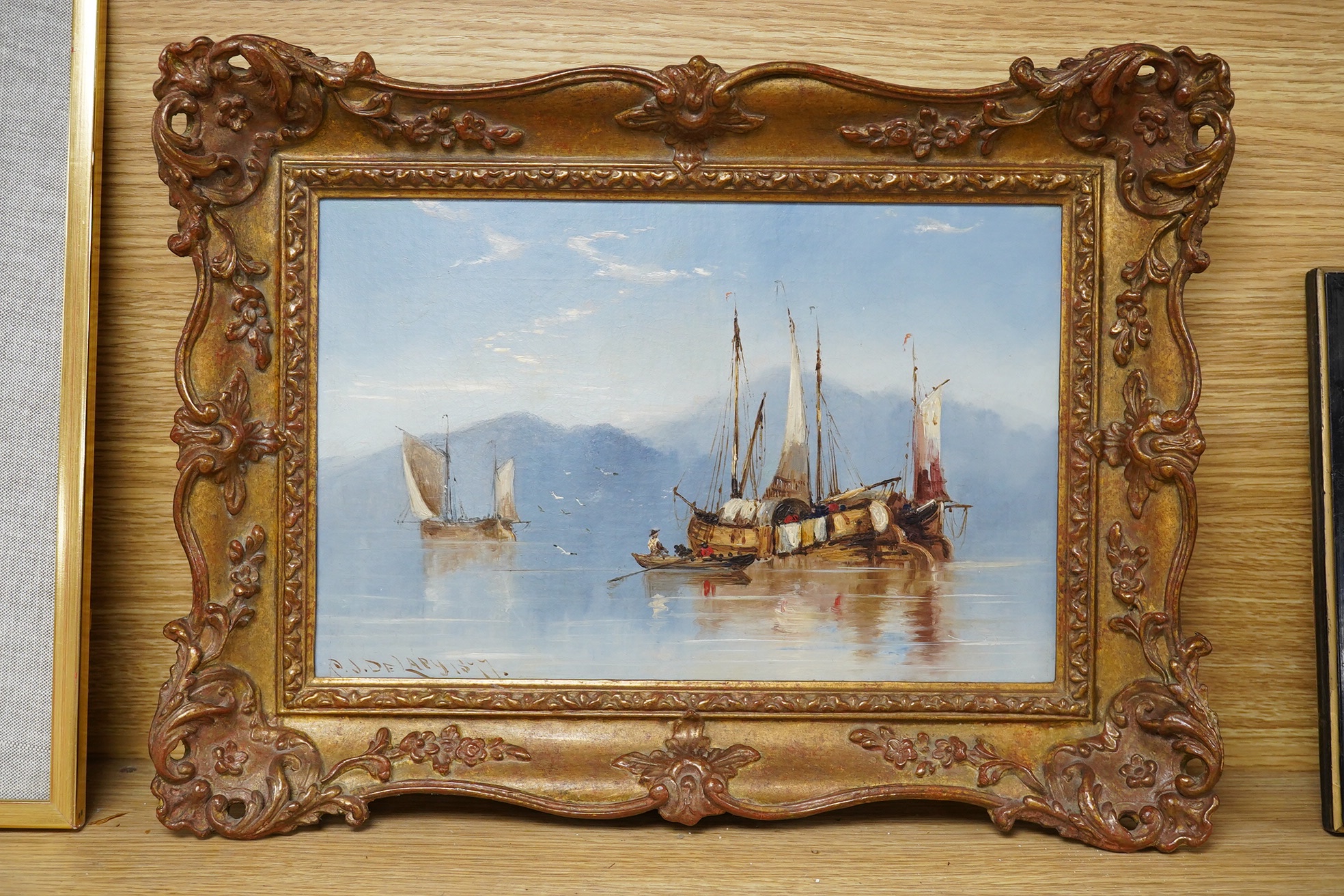 Charles John De Lacy (1860-1936), oil on canvas, “Dutch shipping on the Rhine”, signed and dated 1877, 19 x 30cm, ornate gilt frame. Condition - good, re-lined